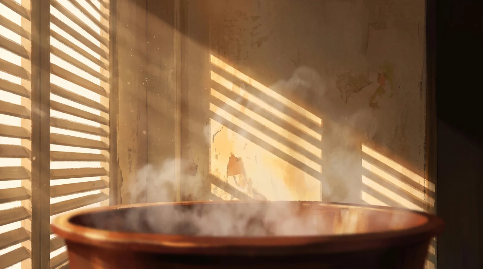 The same room, vat and shutter light, empty, with steam still rising.